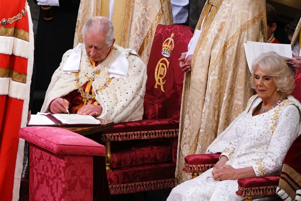 Britain's King Charles III and Britain's Camilla, Queen Consort attend their coronations at Westminster Abbey, in central London on May 6, 2023. - The set-piece coronation is the first in Britain in 70 years, and only the second in history to be televised. Charles will be the 40th reigning monarch to be crowned at the central London church since King William I in 1066. Outside the UK, he is also king of 14 other Commonwealth countries, including Australia, Canada and New Zealand. Camilla, his second wife, will be crowned queen alongside him, and be known as Queen Camilla after the ceremony. (Photo by Yui Mok / POOL / AFP)