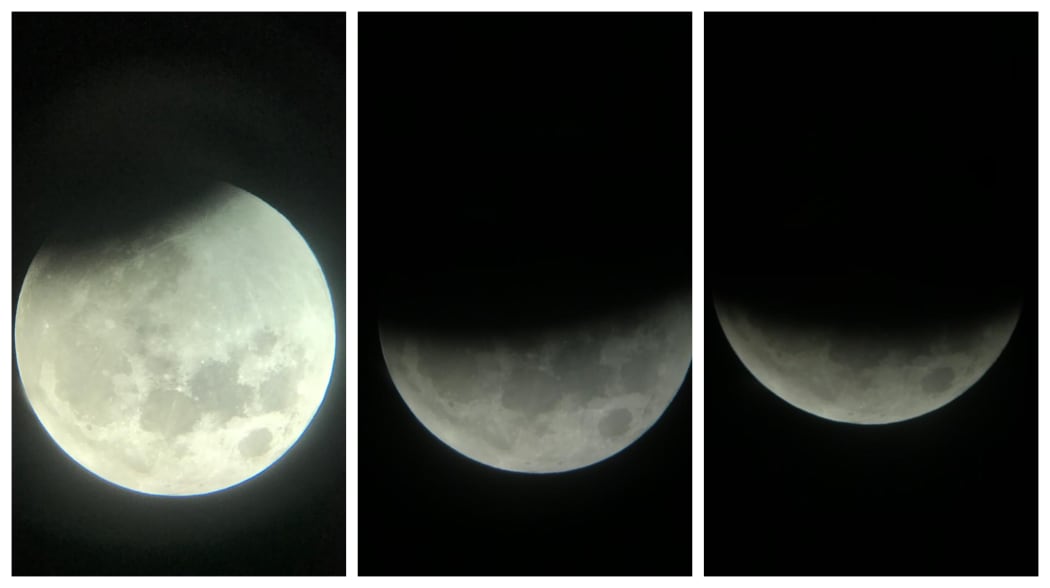 The moon pictured as the lunar eclipse progressed on Wednesday evening.