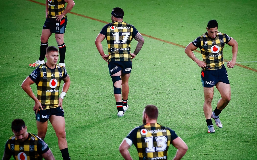 Dejected Warriors players.