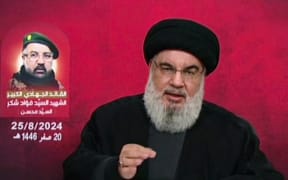 An image grab taken from Hezbollah's al-Manar TV on August 25, 2024, shows Lebanon's Hezbollah chief Hassan Nasrallah giving a televised address from an undisclosed location. Nasrallah said his group's attack on Israel targeted the Glilot base near Tel Aviv, after Israel said it had thwarted a large-scale Hezbollah attack, and launched air strikes on Lebanon. (Photo by Al-Manar / AFP) / RESTRICTED TO EDITORIAL USE - MANDATORY CREDIT "AFP PHOTO / HO / AL-MANAR" - NO MARKETING NO ADVERTISING CAMPAIGNS - DISTRIBUTED AS A SERVICE TO CLIENTS