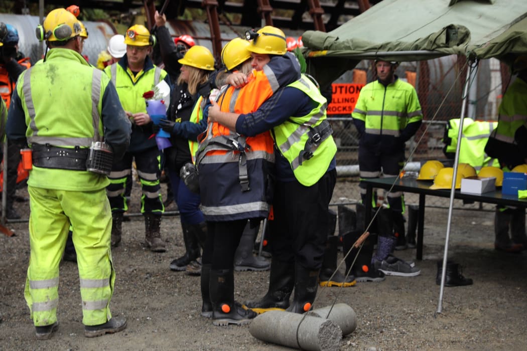 Sonya and Daniel Rockhouse embrace before entering the Pike River drift.