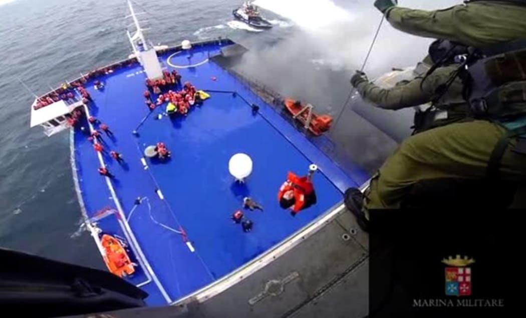 The evacuation of passengers from the burning ferry Norman Atlantic adrift off Albania.
