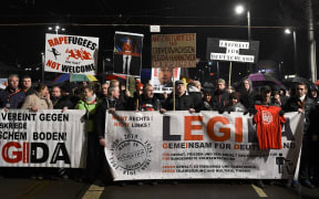Protestors from the far right Pegida movement at a rally in Leipzig on 11 January, following the Cologne assaults.