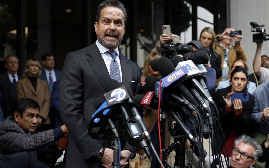Defense attorney Alan Jackson speaks to the press outside Los Angeles Superior Court where the arraignment of Nick Reiner, son of the late film director Rob Reiner, on double murder charges was continued until January 7, 2026, on December 17, 2025 in Los Angeles, California. The son of famed Hollywood director Rob Reiner was charged with two counts of first-degree murder over the brutal slaying of his parents, the chief prosecutor of Los Angeles said on December 16. (Photo by Caroline BREHMAN / AFP)