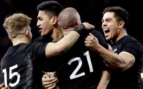 Wing Rieko Ioane celebrates an All Blacks try with Damian McKenzie, TJ Perenara and Anton Lienert-Brown. NZ vs Wales.