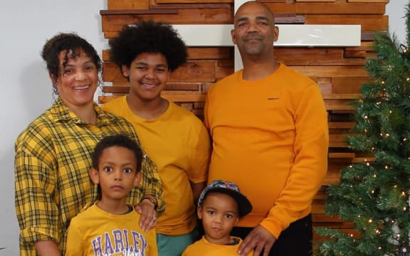 Alvin April and his wife Megon Dyson-April, and their three sons.