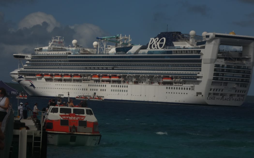 P&O's cruise ship Pacific Adventure moored off Lifou Island, New Caledonia during a cruise in June 2023.