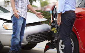Drivers argue after a car crash (stock photo).