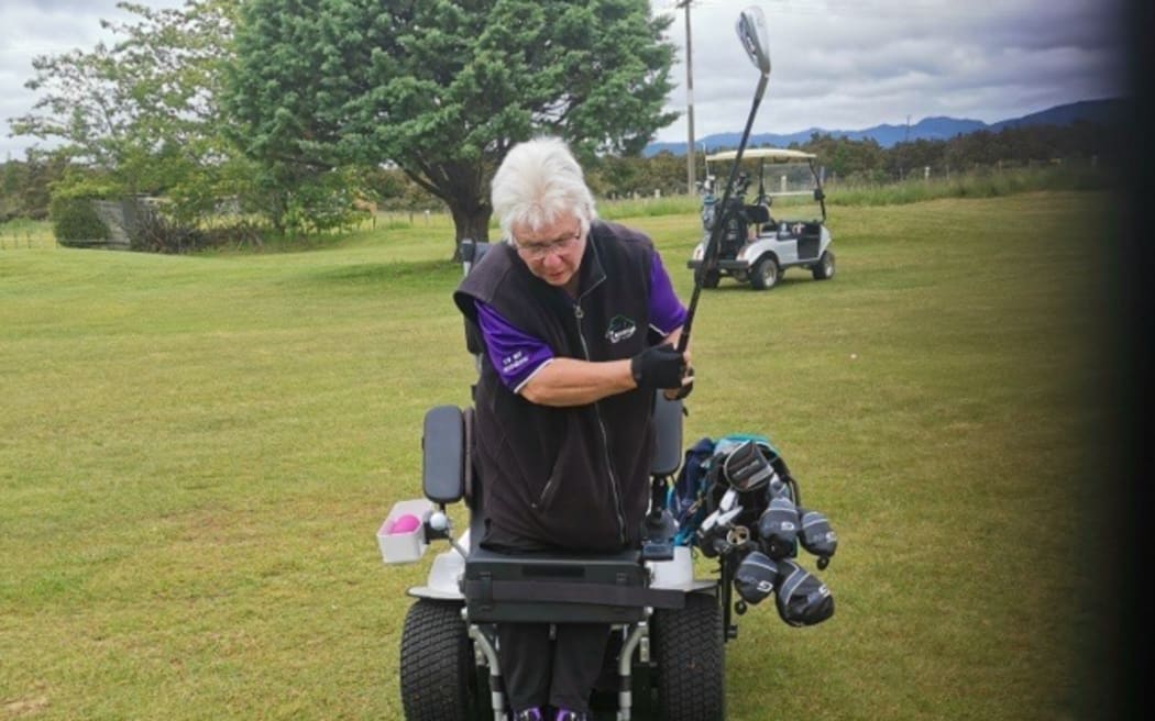 Cathie Braun on the course in her specially designed golf chair