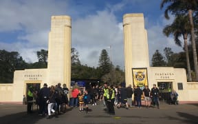 Fans stream through the gates into Pukekura Park.