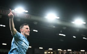 Nottingham Forest's New Zealand striker Chris Wood celebrates after scoring his team's third goal against Manchester United in a Premier League game at Old Trafford. Dec 7, 2024.