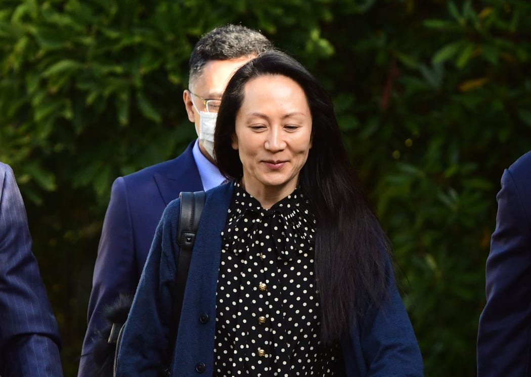 Huawei Chief Financial officer Meng Wanzhou leaves her Vancouver home to attend her extradition hearing, 24 September 2021, in Vancouver, Canada.