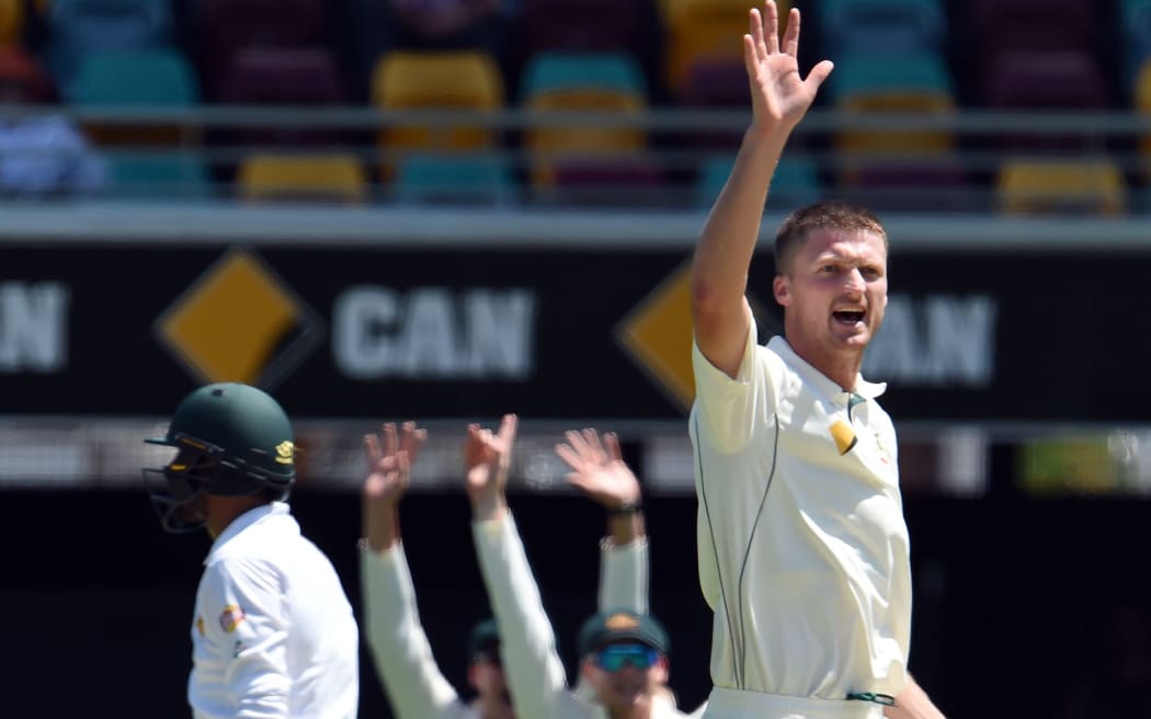 Jackson Bird (R) shouts a successful caught behind appeal against Mohammad Amir.