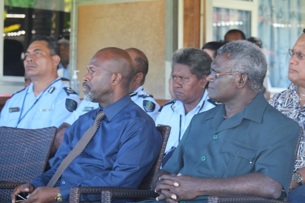 PM Sogavare and his Deputy Douglas Ete listen to speeches at GBR