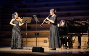 The trio Amallegro performing on stage at Auckland Town Hall