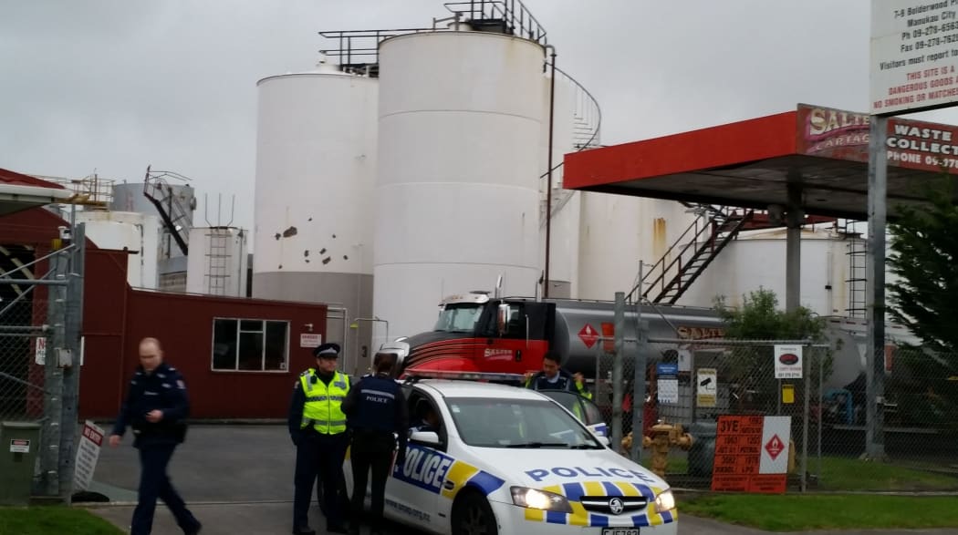 Police stationed outside Salter Cartage factory.