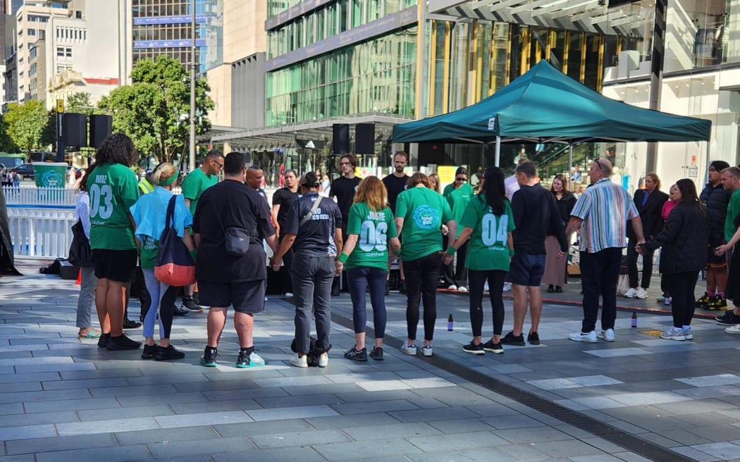 Group pay respects where Efeso Collins died - singing waiata led by Dave Letle