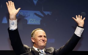 John Key celebrates National winning another term in government in September.