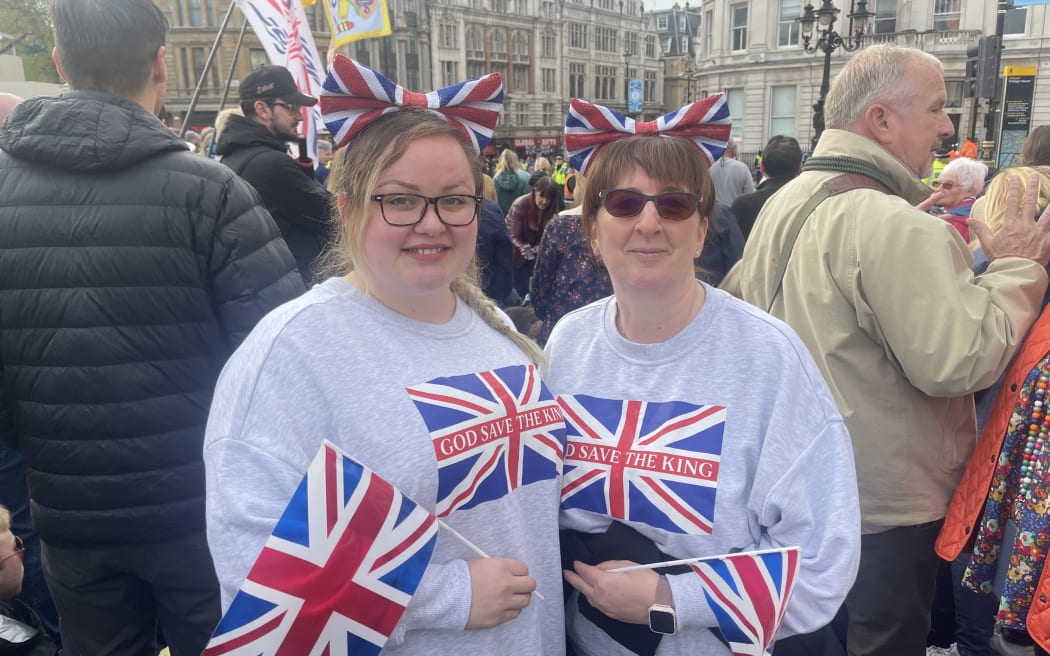 Royal watchers gather in London as the Coronation day dawns.