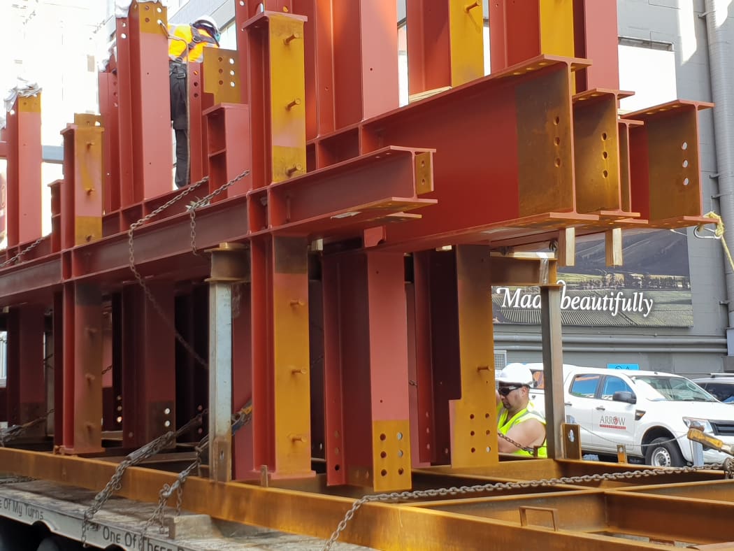 Steel frames made in China are unloaded at the 20-storey 111 Dixon St project.