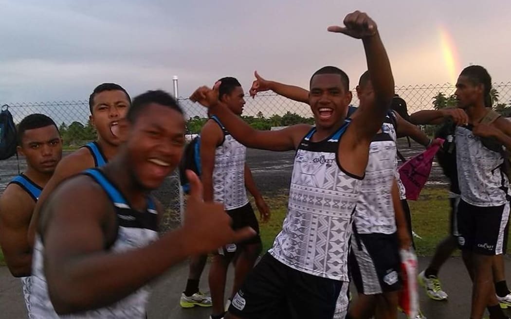 The Fiji Under 19 cricket team celebrate beating Papua New Guinea.