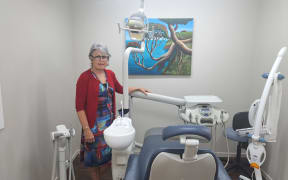 Aotea Community Health Trustee Leonie Howie with donated dental equipment.