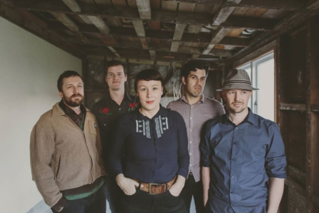 Five band members of Eb and Sparrow