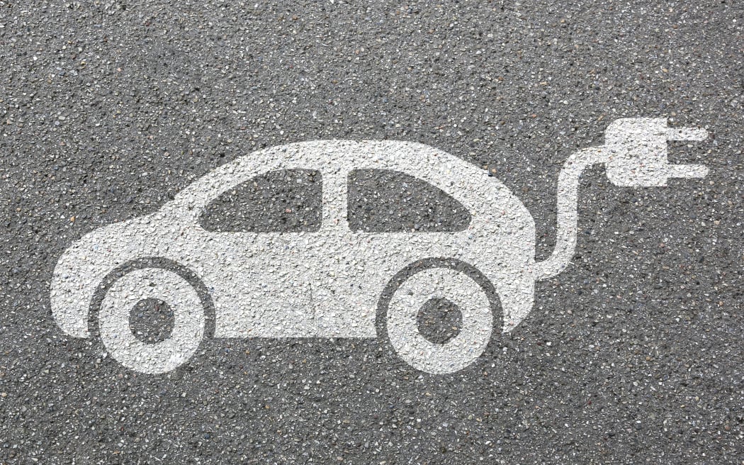 Electric car charging station vehicle street road traffic eco friendly mobility transportation
