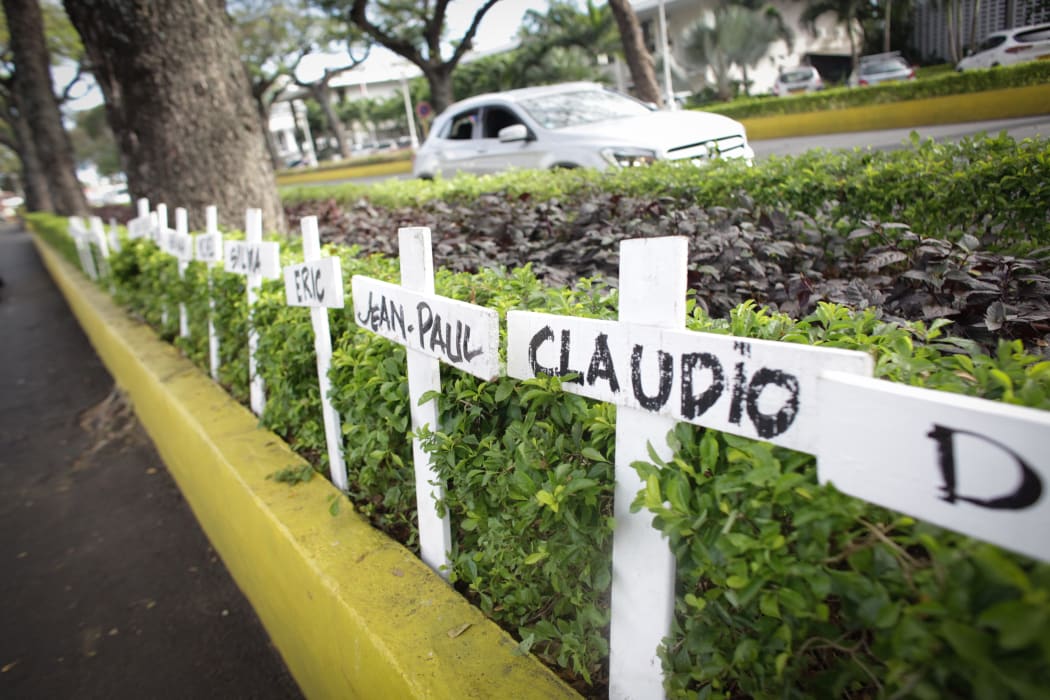 Crosses bearing names of victims set in front of Papeete Court house, on the first day of the trial of Air Moorea company, 11-years after the crash of one of its aircrafts in which 20 people were killed.