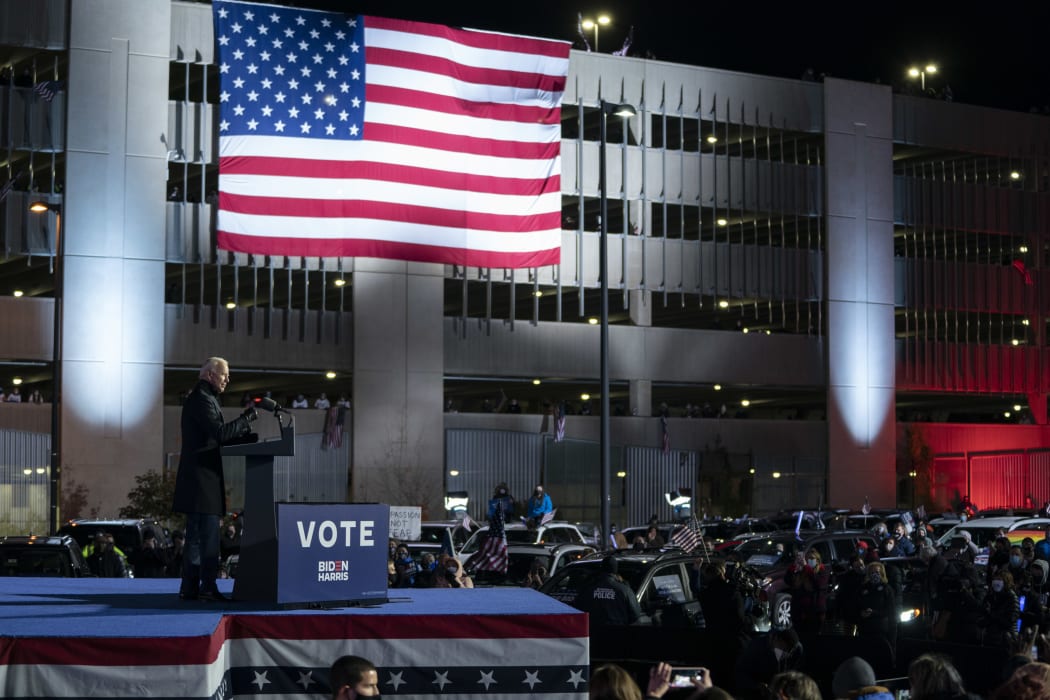 Joe Biden speaks during a drive-in campaign rally at Heinz Field in Pittsburgh, Pennsylvania. One day before the election.