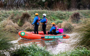 Search for Yanfei Bao's body along Halswell River in the Greenpark area