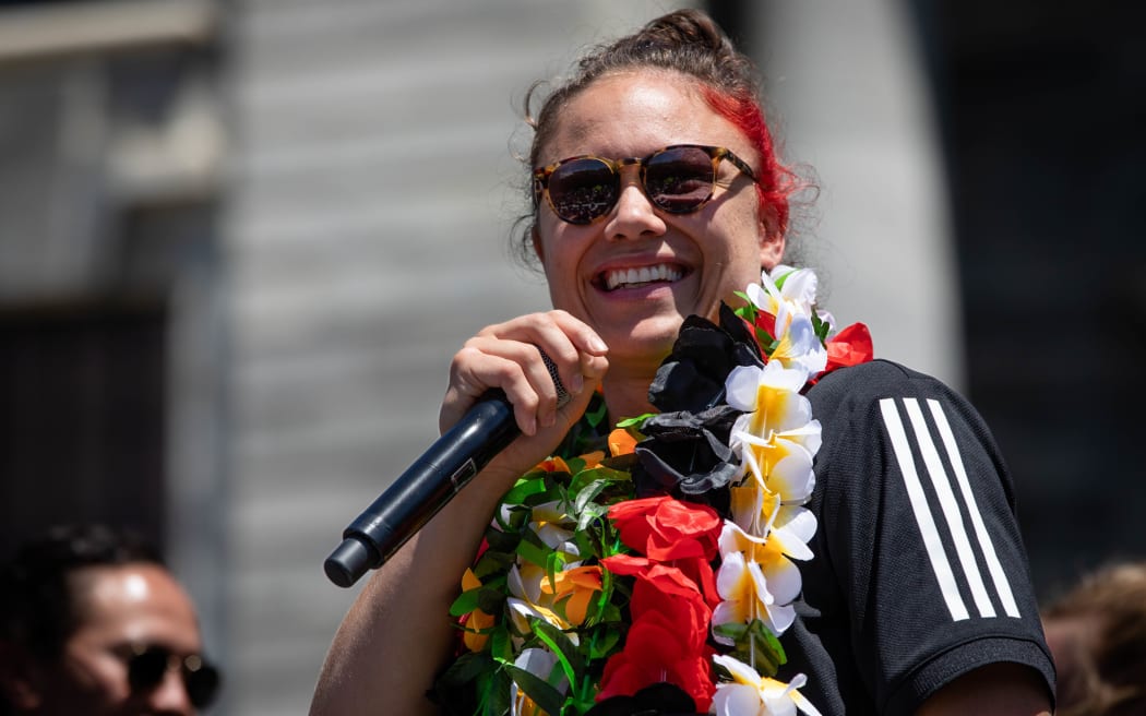 Fans celebrate the Black Ferns at an event at Parliament