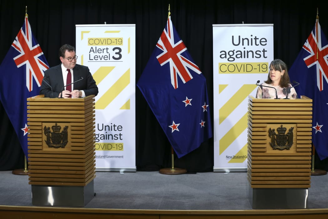 Director of Public Health Dr Caroline McElnay speaks to media while Finance Minister Grant Robertson looks on during a Covid-19 update conference at Parliament on May 08, 2020.