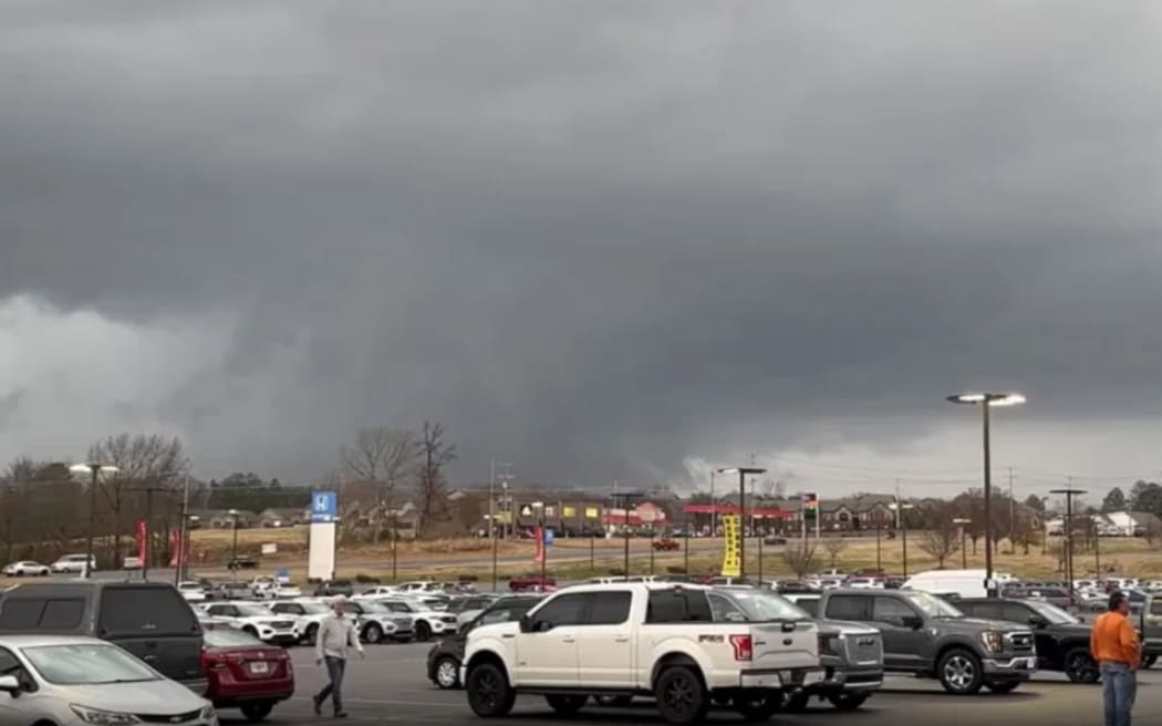 In a screenshot from a video posted to social media, a possible tornado is shown in Clarksville, Tennessee on Saturday.