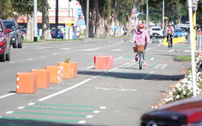 Colleen O’Byrne rides the cycleway twice a day and feels safer with a barrier between her and traffic.
