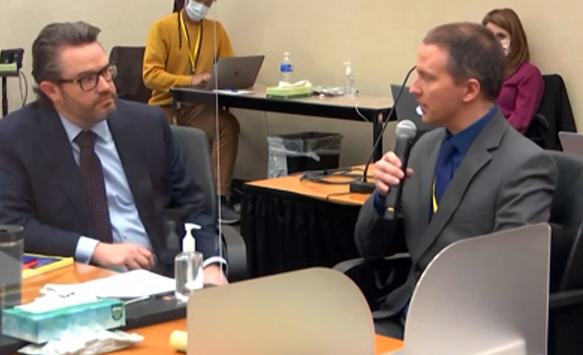 This screenshot from Court TV shows former Minneapolis police officer Derek Chauvin, right, sitting next to defence attorney Eric Nelson, as he tells the presiding judge he has decided not to testify in his own defence.