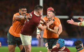 Nic Whiteof Australia and Dan Sheehan of the British and Irish Lions get into a confrontation.