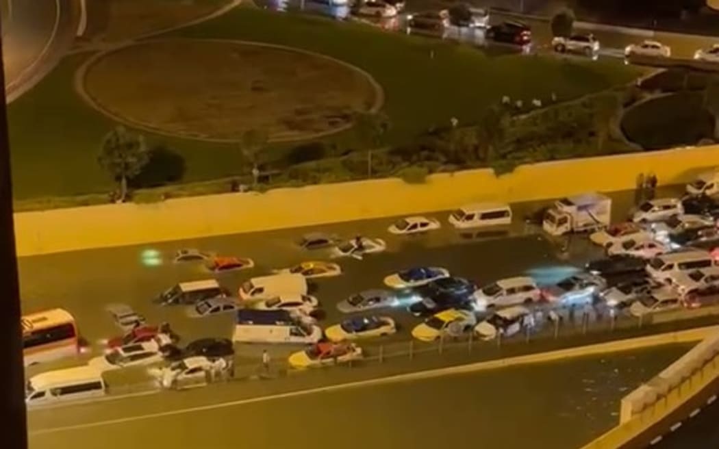 Hundreds of cars were left abandoned on the streets of Dubai as flash floods caused havoc across the city after receiving a year's worth of rain in a matter of hours.