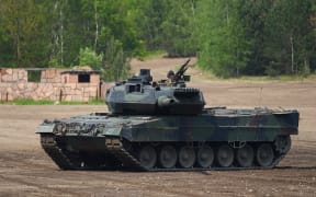 This file photo taken on 20 May, 2019 shows a Leopard 2 A7 main battle tank of the German armed forces Bundeswehr taking part in an educational practice of the Very High Readiness Joint Task Force (VJTF) as part of the NATO tank unit at the military training area in Munster, northern Germany.