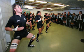 Ali Williams (L) and the All Blacks perform the Haka in the dressing prior to the international rugby match between Wales and New Zealand in 2006.