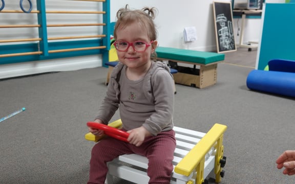 After she was born, doctors asked Julia Tiffen's parents if they wanted to "redirect care". She's now moving around and has begun speaking.