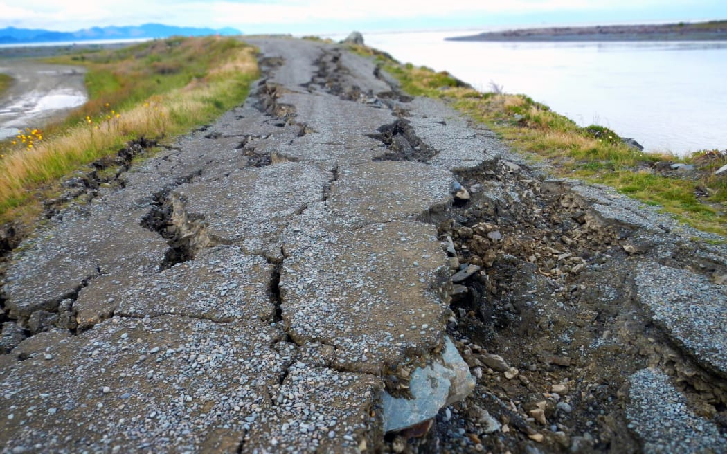 Lateral spreading happens when liquefaction stretches and tears the ground. This example happened during the 2011 Christchurch earthquake.