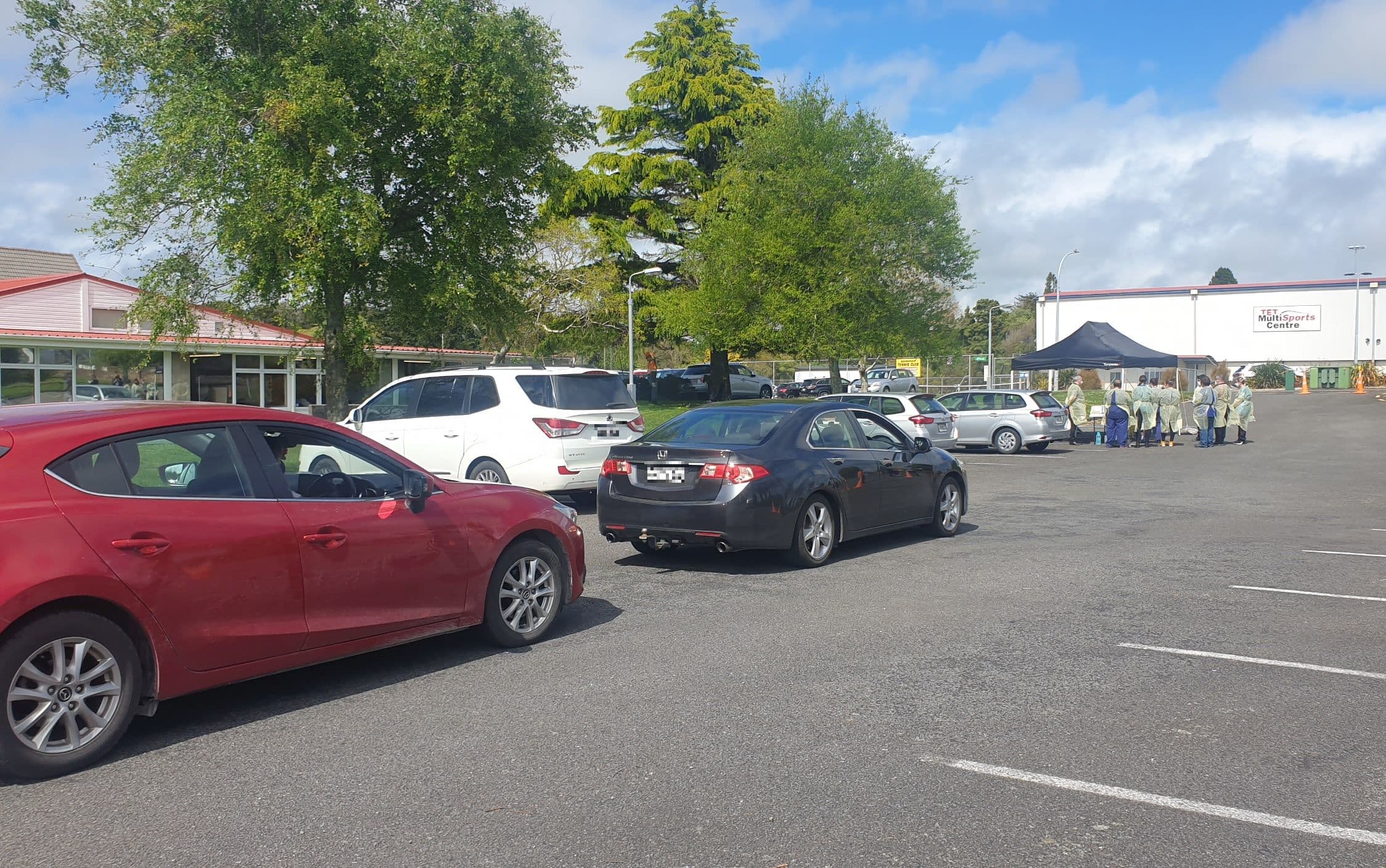 People arrive at a testing centre in Stratford after Covid-19 was detected in wastewater and people were urged to get tested.