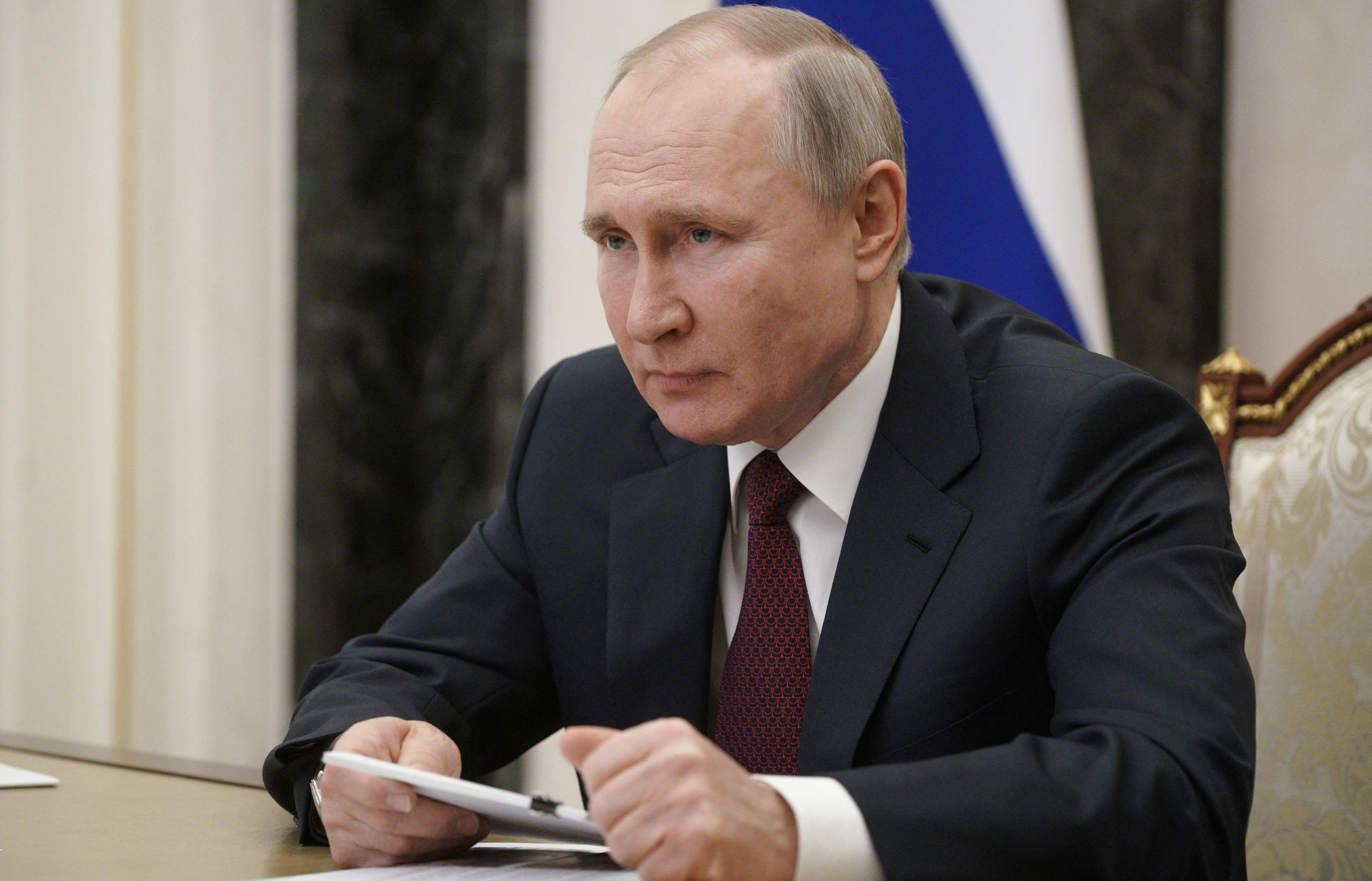 Russian President Vladimir Putin attends a meeting on social and economic development of Crimea and Sevastopol, via teleconference call, at the Kremlin in Moscow, Russia.