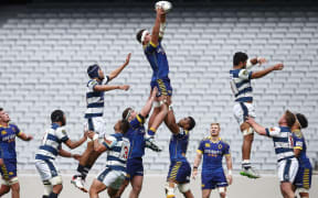 Otago's Thomas Franklin takes the ball.