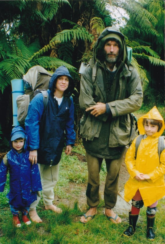 Robert Long and Catherine Stewart with their children, Chris and Robin, at Big Bay at the start of the walk to the Hollyford Road end, 1998.