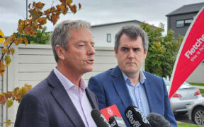 Andrew Bayly and Chris Bishop in Auckland today announcing lending changes by the government.