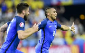Dimitri Payet celebrates a goal for France.