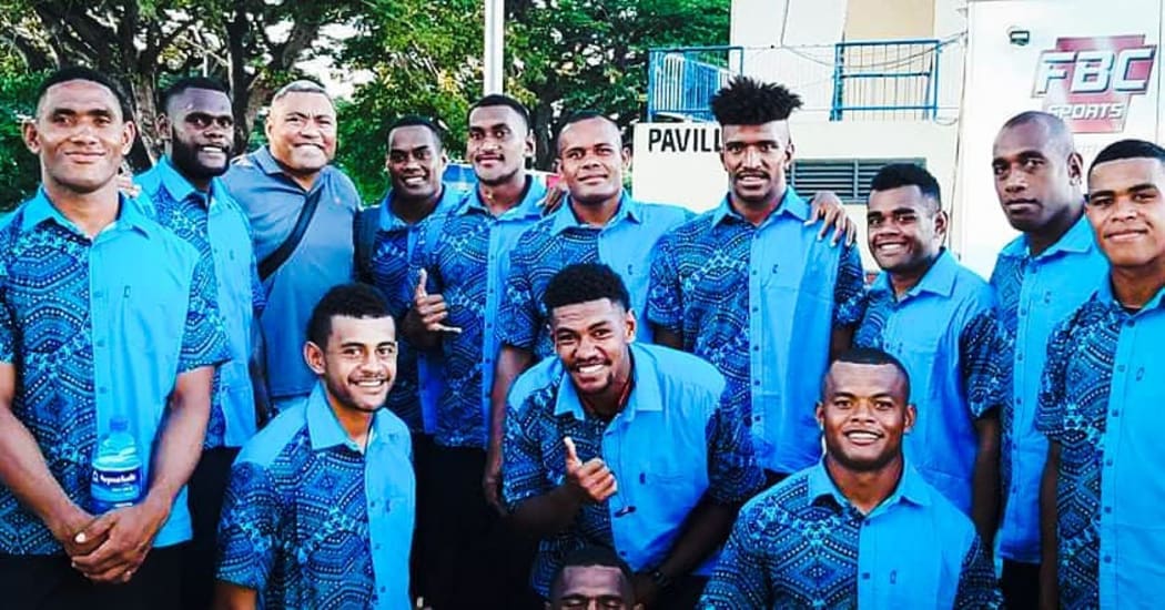 Kaiviti Silktails players with chairman, Petero Civoniceva.