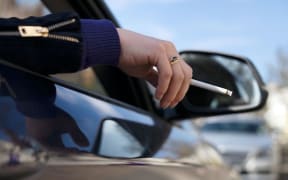 A health promoter said 100,000 children were exposed to second-hand smoke in cars each week.